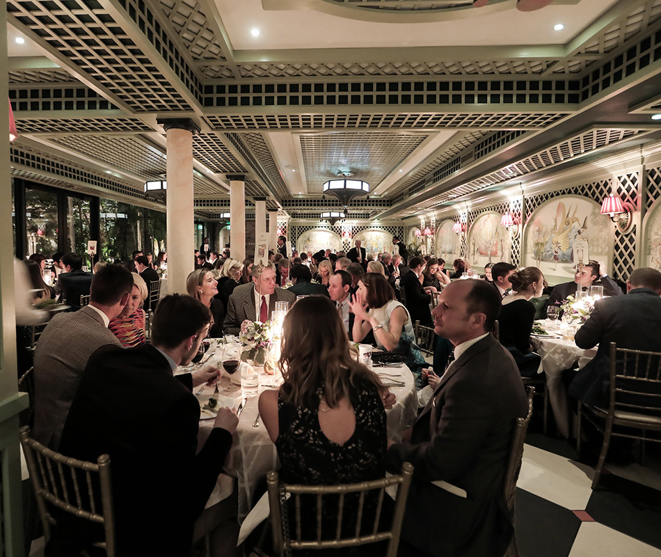 A party of guests sitting eating at Brennan's