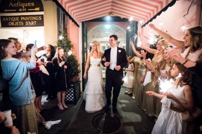 Bride & groom with sparkler send-off exit on Royal Street